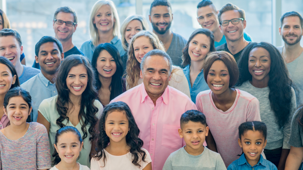 A group of people, diverse ages, ethnicities and genders
